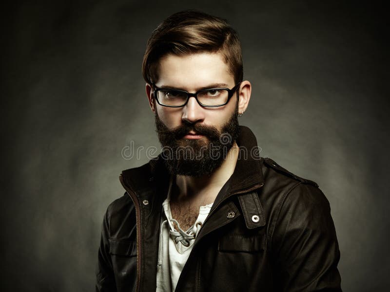 Portrait of man with glasses and beard