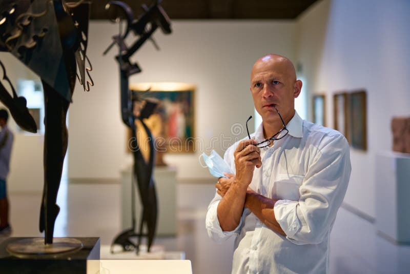 Portrait Man Looking Art Gallery or Museum. Editorial Stock Photo