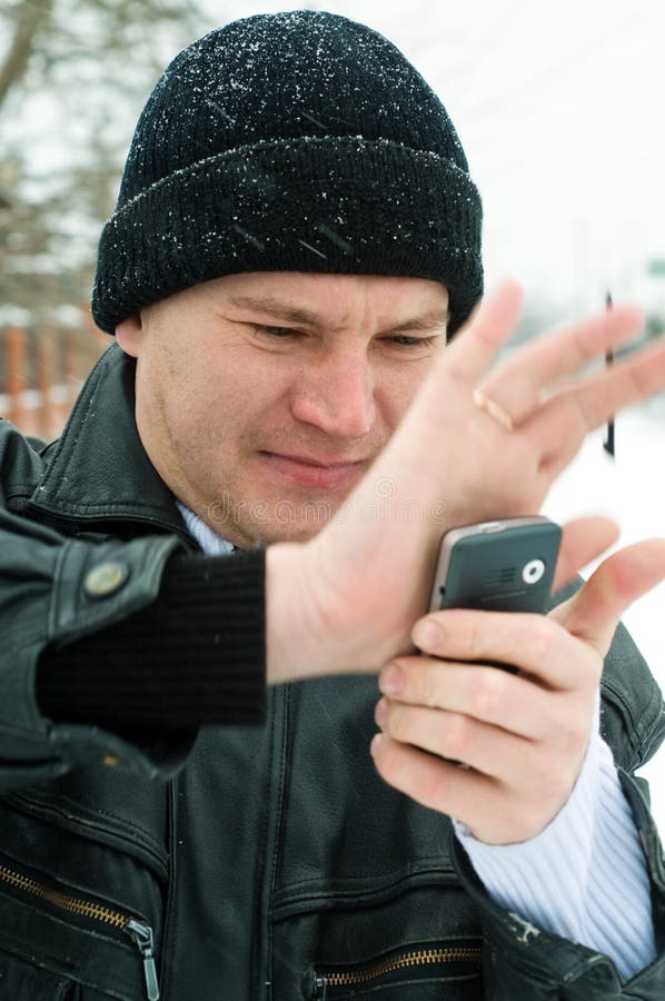 Portrait of the man with a mobile phone.