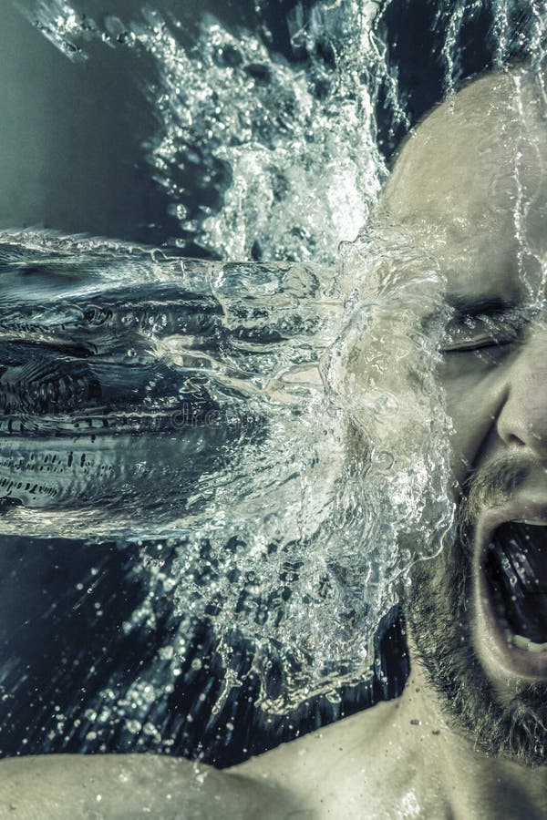 Portrait of a Man Receiving a Bucket of Water in His Face Stock Photo ...