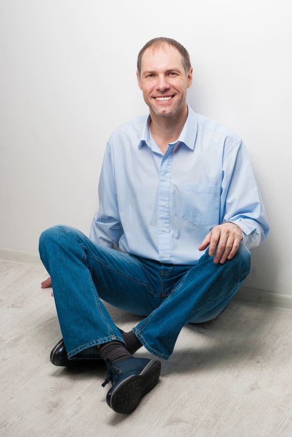 Portrait of Man Sitting on the Floor Stock Image - Image of manager ...