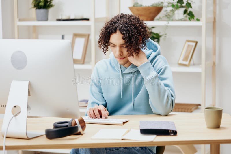 Portrait of a Man Sitting in Front of the Computer Work at Home