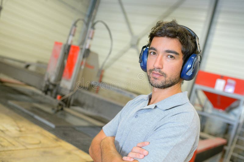 Portrait Man Wearing Earmuffs Stock Image Image of defenders, unit