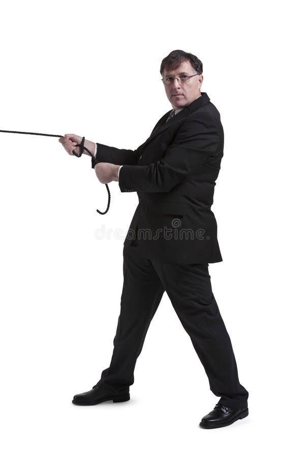Portrait Of Mature Businessman Pulling Rope royalty free stock photos