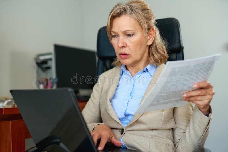 Portrait of Mature Female Boss Working in Office Stock Photo - Image modern, mature: 181104080