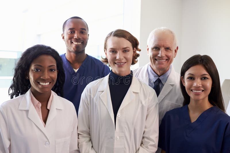 Portrait Of Medical Staff In Hospital Exam Room