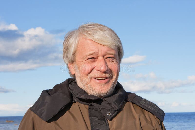 Portrait of middle-aged man at the sea.