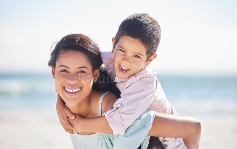 Portrait of a Mixed Race Boy Laughing while Enjoying a Piggyback Ride ...