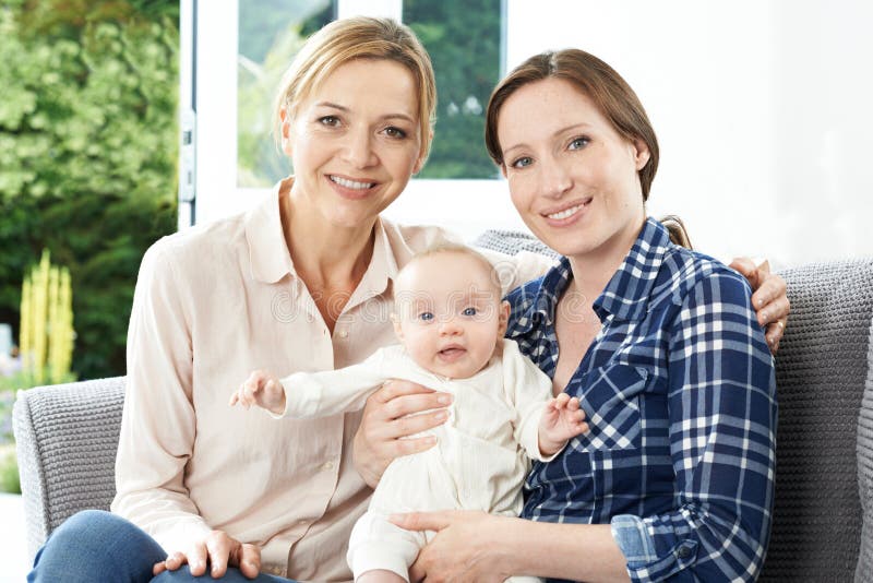 Portrait Of Mother With Adult Daughter And Baby stock photography Portrait Of Mother With Adult Daughter And Baby stock photography