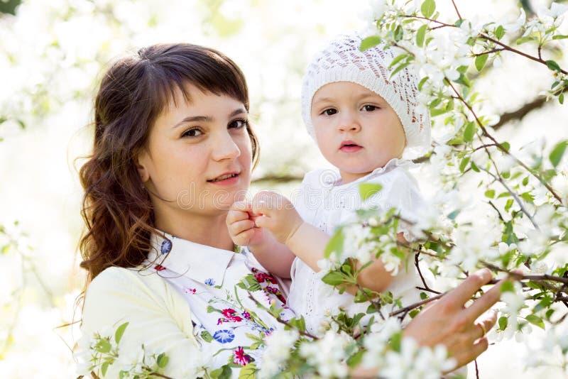 Portrait of mother and baby girl outdoors royalty free stock photo Portrait of mother and baby girl outdoors royalty free stock photo
