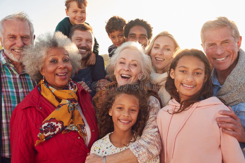 Portrait Of Multi-Generation Family Group On Winter Beach Vacation royalty free stock images