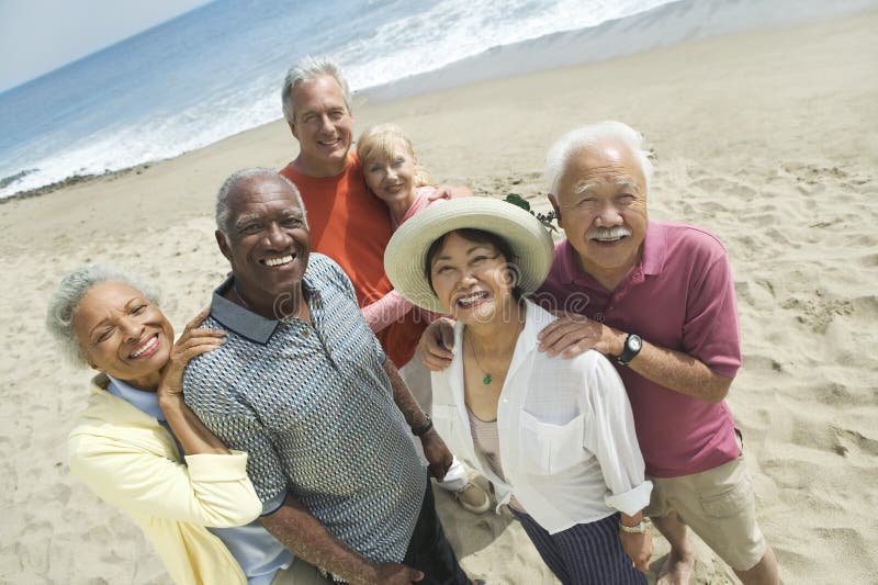 Portrait Of Multiethnic Couples At Beach