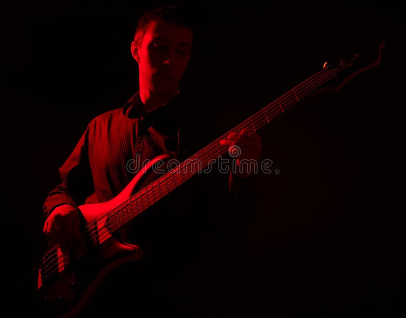 Portrait of musician with bass guitar