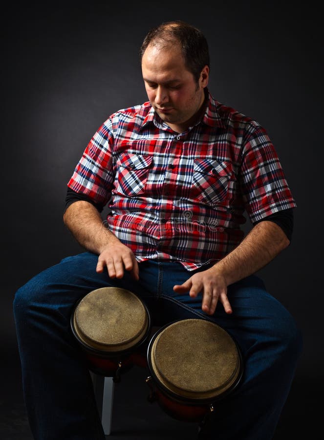 Portrait of musician with bongo