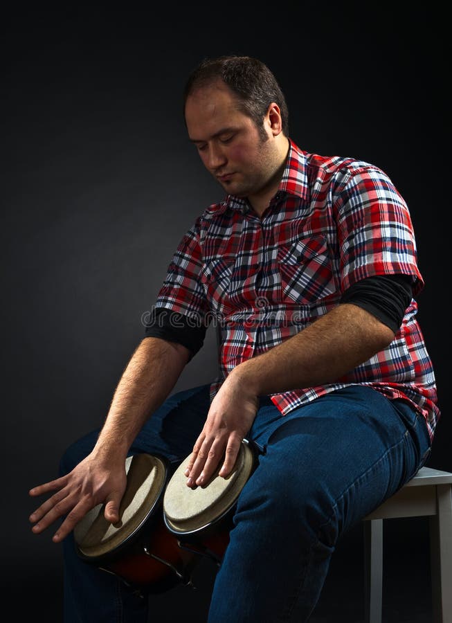 Portrait of musician with bongo