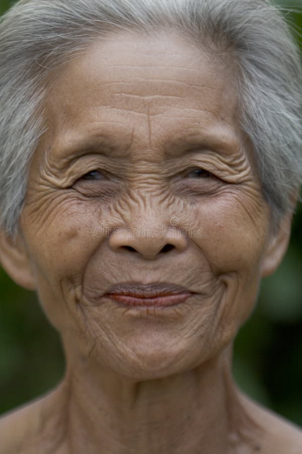 Portrait of an old Asian woman with gray hair