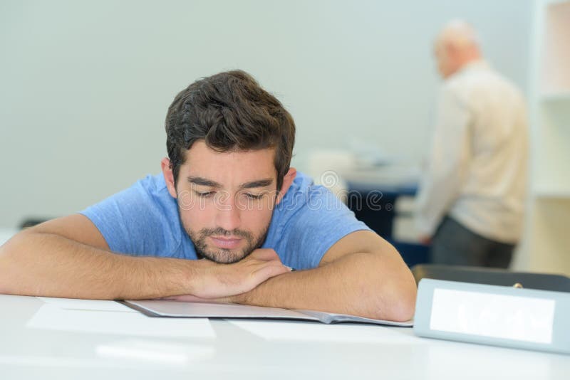 Portrait overworked businessman sleeping in office royalty free stock photo Portrait overworked businessman sleeping in office royalty free stock photo