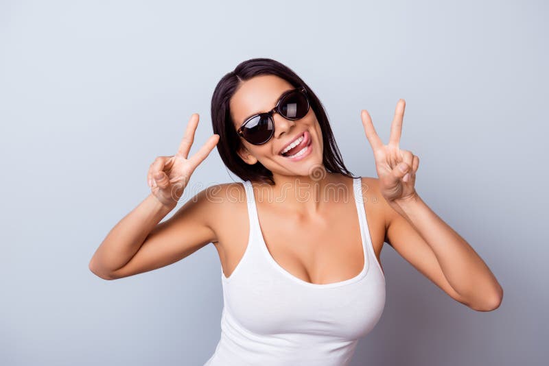 Portrait of a playful young latin girl with tongue out. She is i stock image Portrait of a playful young latin girl with tongue out. She is i stock image