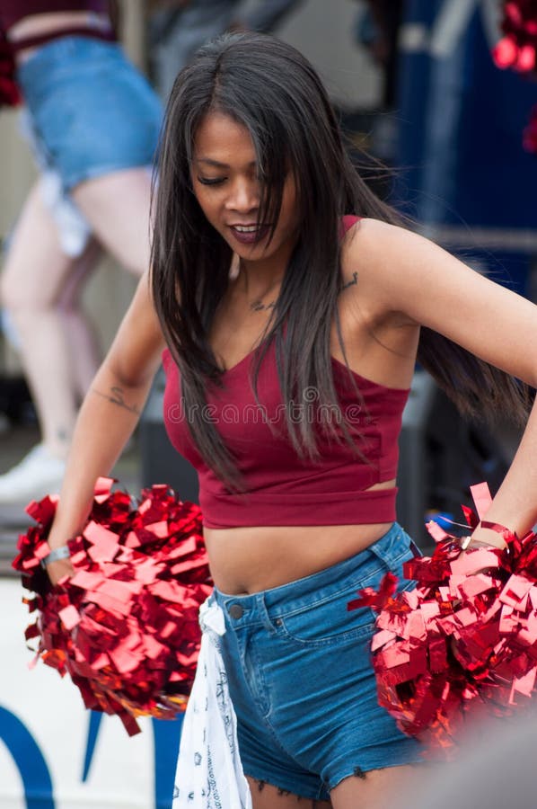 Portrait of pompom girls dancing at Fun car show event stock photography Portrait of pompom girls dancing at Fun car show event stock photography