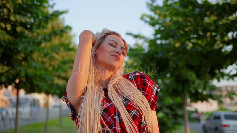 Portrait Pretty Blonde Girl Straightens Her Long Hair And Cute Smiling Standing On Alley With 