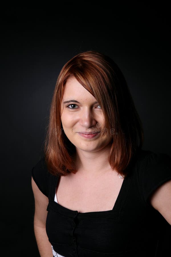 Portrait of pretty teenager with auburn hair