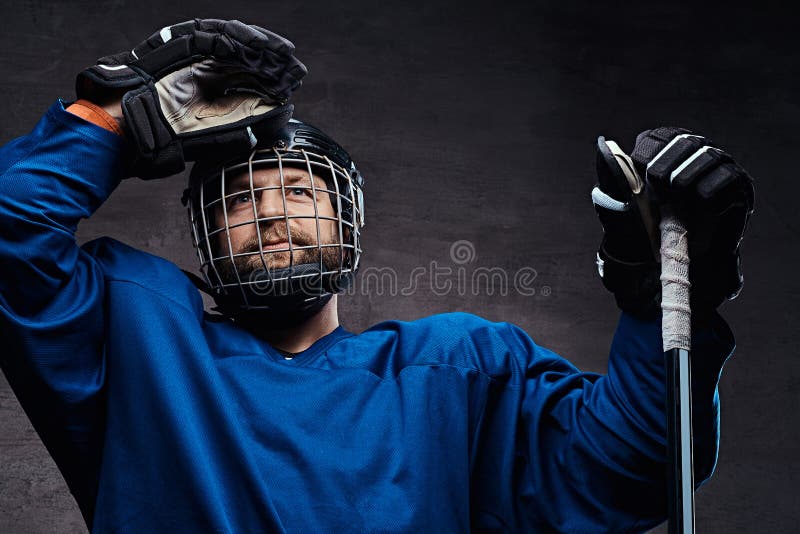 Portrait of a Professional Icehockey Player in a Hockey Uniform