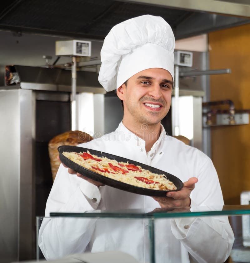 Portrait of Professional Attentive Male Chef Baking Pizza Stock Photo ...