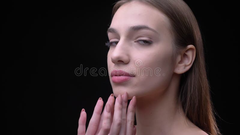 Portrait in Profile of Young and Slim Caucasian Girl with Nude Make-up Softly Touching Her Face and Closing Eyes on Stock Video - Video of movements, female: 139195271