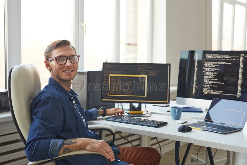 Portrait of it Programmer Using Computers with Code on Screen Stock ...