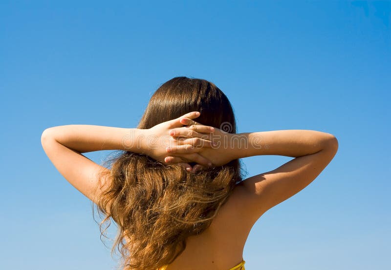 Portrait relax girl on sky background royalty free stock photography