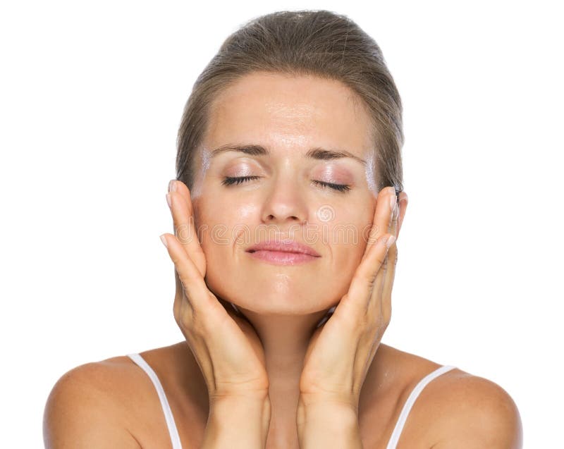 Portrait of relaxed young woman with wet face