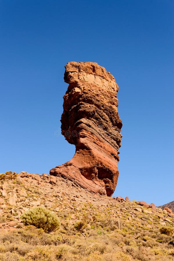 Portrait of Roque Cinchado is a volcanic rock formation on a sunny and very clear day in El Teide National Park. April 13, 2019. Santa Cruz De Tenerife Spain Africa. Travel Tourism Street Photography