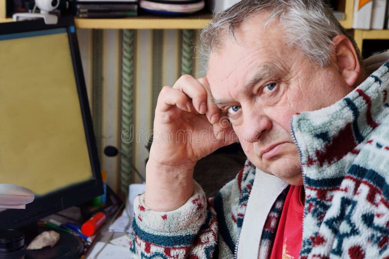 Portrait of sad elderly man