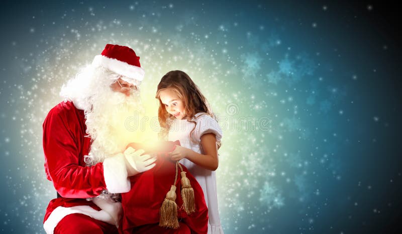 Portrait of santa claus with a girl