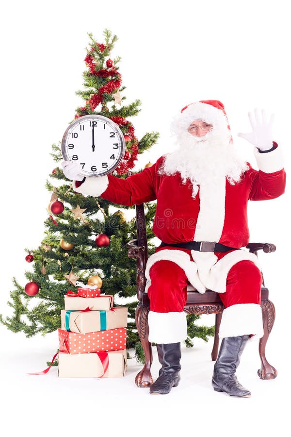 Santa near Christmas tree stock photo. Image of holiday - 110925494