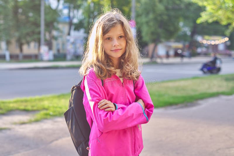 Portrait of school girl in jacket with backpack royalty free stock image Portrait of school girl in jacket with backpack royalty free stock image