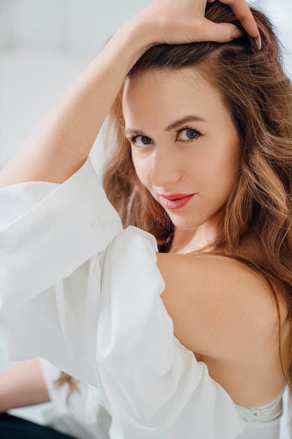 Portrait of a Seductive Woman in a Romantic Top. Stock Image - Image of