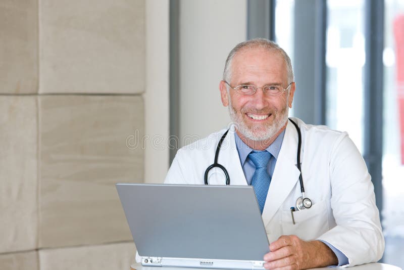 Portrait of a Senior Caring Doctor Stock Photo - Image of medicine ...