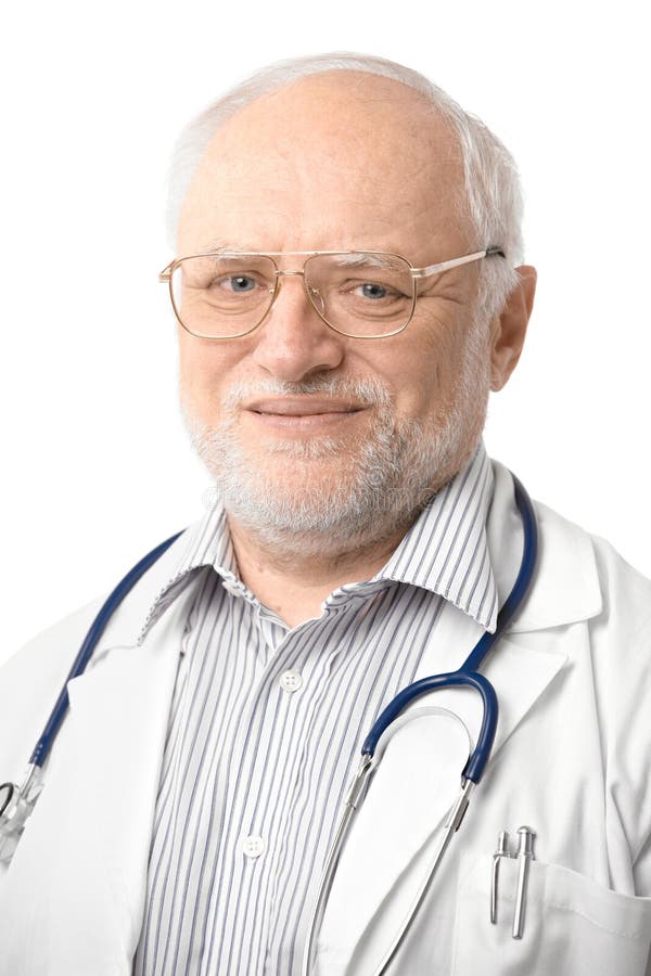 Portrait of senior doctor looking at camera