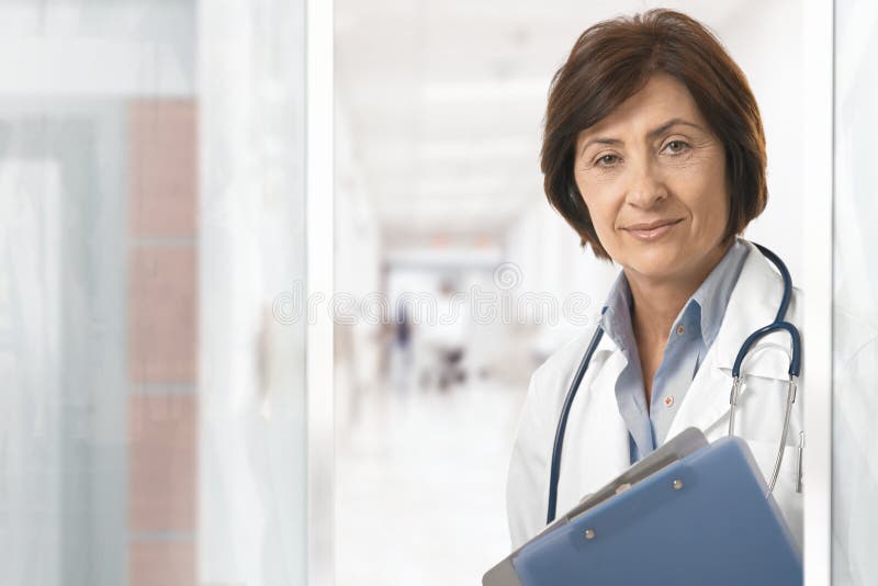 Portrait of senior female doctor at hospital