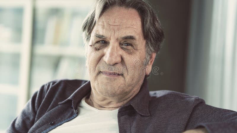 Portrait of senior man at home stock photos Portrait of senior man at home stock photos