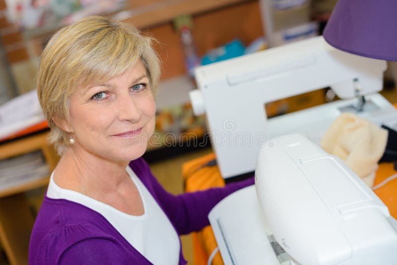 Portrait Senior Woman Using Sewing Machine Stock Photo Image of