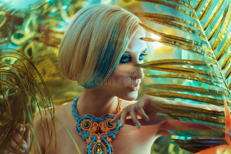 Portrait of a sensual blond lady in the tropics