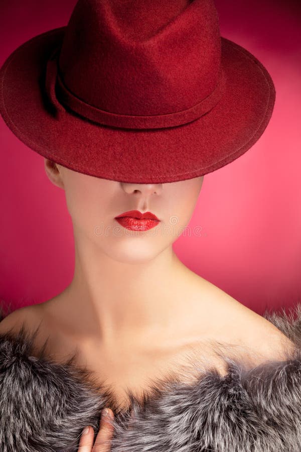 Portrait of sensuality stylish woman in red hat