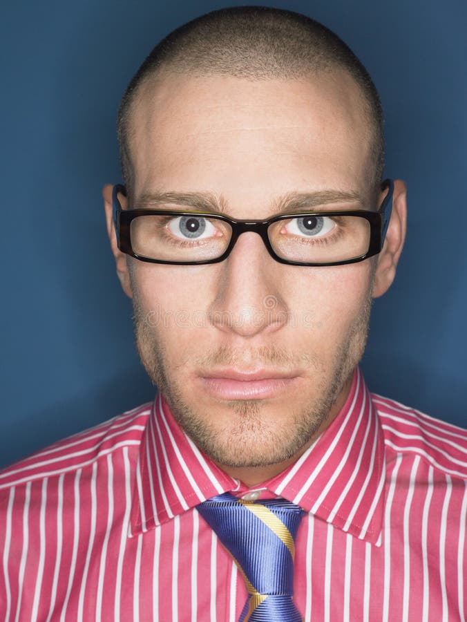 Portrait Of Serious Bald Man In Glasses Royalty Free Stock Photo