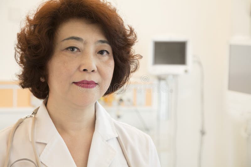 Portrait of serious and confident female doctor stock image Portrait of serious and confident female doctor stock image