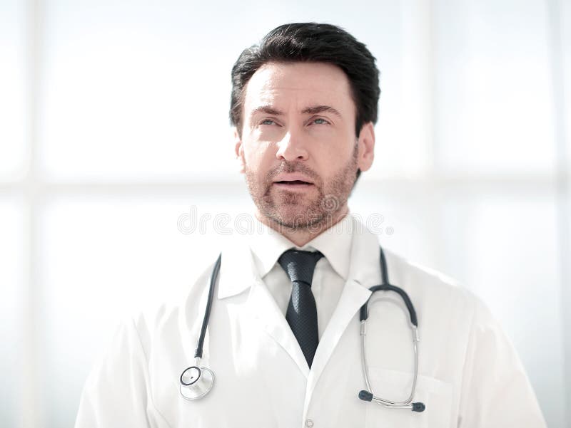 Portrait of serious doctor on blurred background royalty free stock photos Portrait of serious doctor on blurred background royalty free stock photos