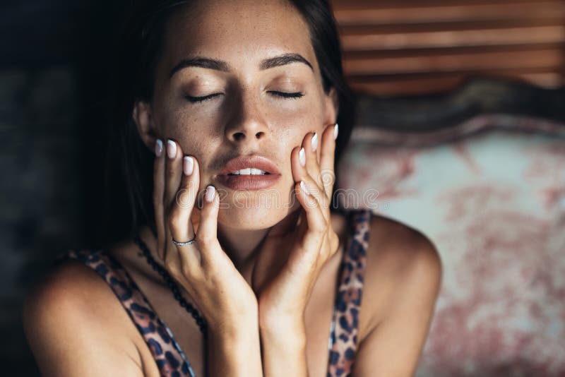 Portrait Of Sensual Brunette Girl With Closed Eyes And Natural Make Up