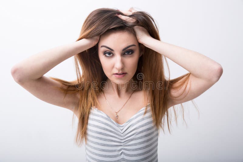 Portrait of a woman touching her hair royalty free stock photos Portrait of a woman touching her hair royalty free stock photos