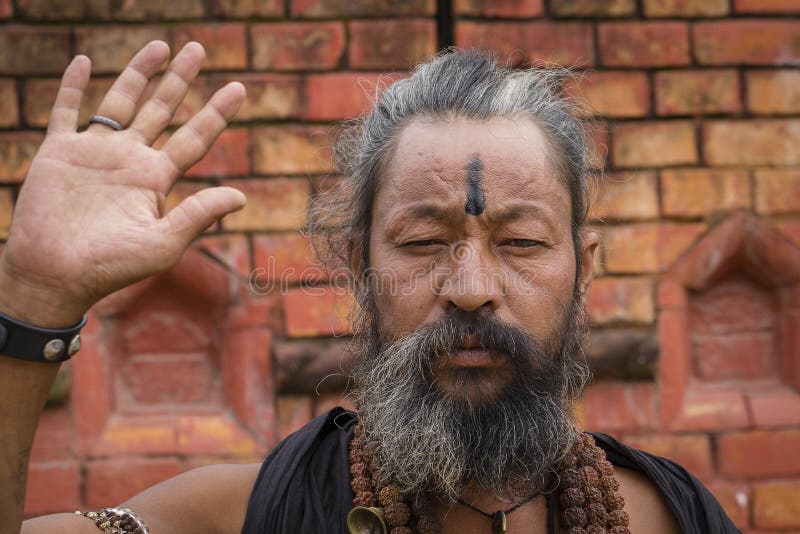 Portrait of Shaiva sadhu, holy man in Pashupatinath Temple, Kathmandu. Nepal royalty free stock image Portrait of Shaiva sadhu, holy man in Pashupatinath Temple, Kathmandu. Nepal royalty free stock image